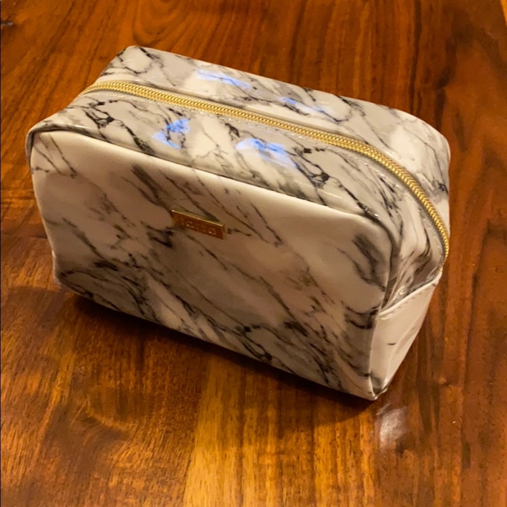 White marbled tarte make up/ cosmetics bag